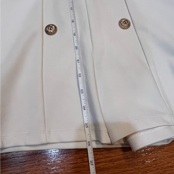 White Symphony Romper with Gold Lion Buttons - Picture 4 of 8